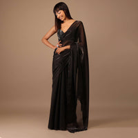 Black Organza Saree With Heavily Embellished Blouse With Fringes On The Hem