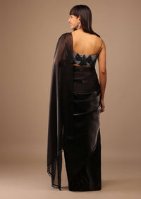 Black Organza Saree With Heavily Embellished Blouse With Fringes On The Hem