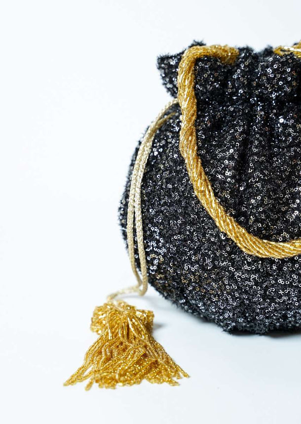 Black Potli Bag In Sequins Fabric With Cut Dana Tassels And Handle By Solasta