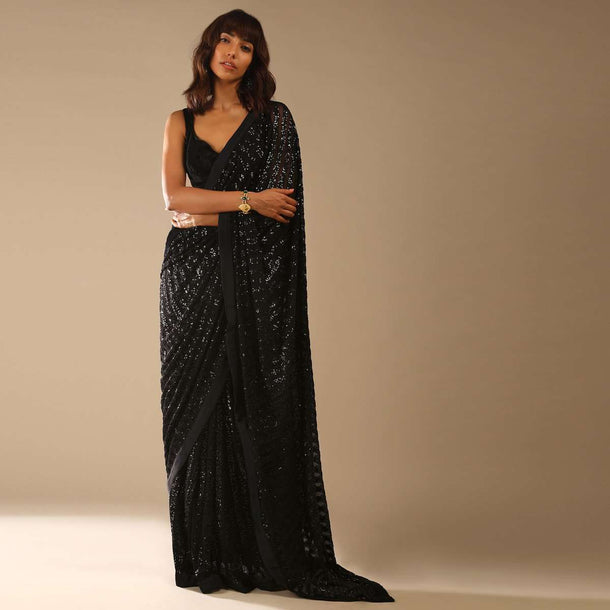Black Ready Pleated Saree Embellished In Sequins And A Sleeveless Velvet Blouse With A Front Cut Out