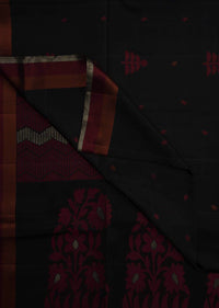 Black saree in silk beautified in weaved embroidery only on Kalki