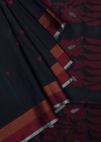 Black saree in silk beautified in weaved embroidery only on Kalki