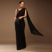 Black Saree With A Crop Top In Multi-Colored Sequins Embellishment Padded With Tie-Up Tassel Dori At The Back