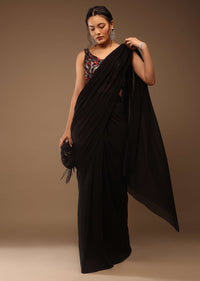 Black Saree With A Crop Top In Multi-Colored Sequins Embellishment Padded With Tie-Up Tassel Dori At The Back