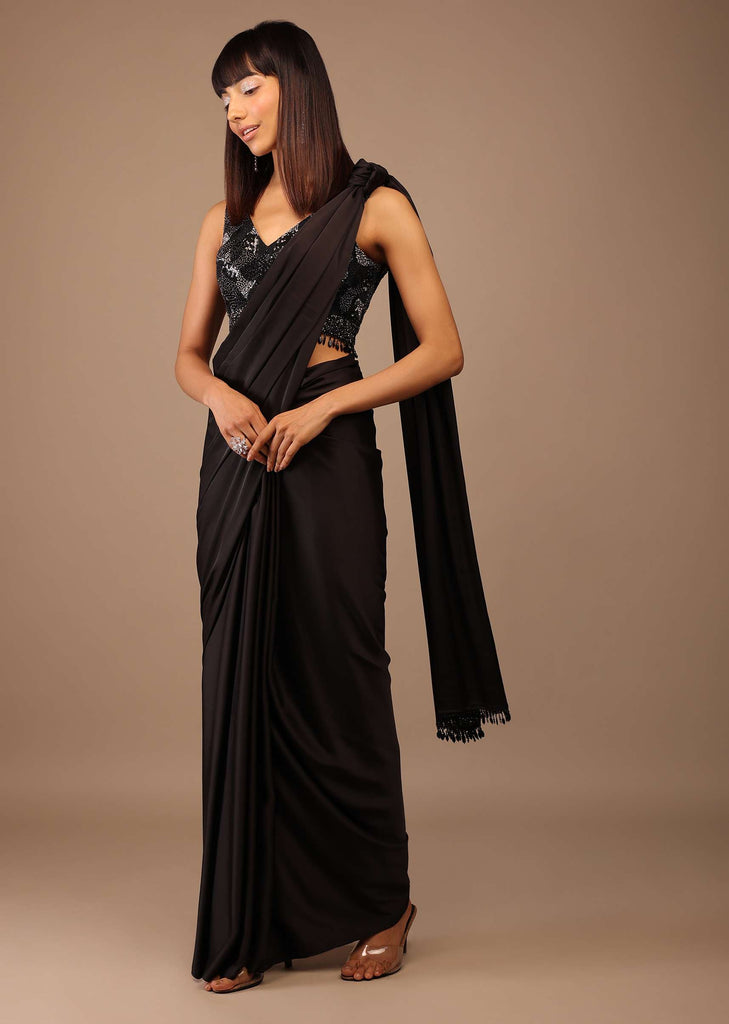 Black Satin Saree With Hand Embroidered Blouse With Fringes On The Hem