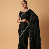 Black Satin Saree With Stone Embellishments And Unstitched Blouse Piece