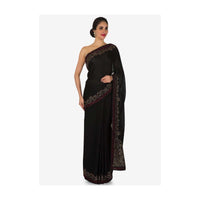 Black satin silk saree with unstitched blouse adorn in kundan embroidery work only on Kalki