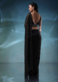 Black Sequins Saree With A Heavily Embroidered Blouse