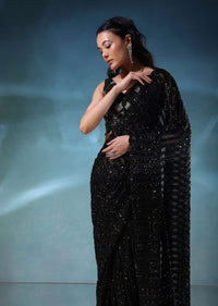 Black Sequins Saree With A Heavily Embroidered Blouse