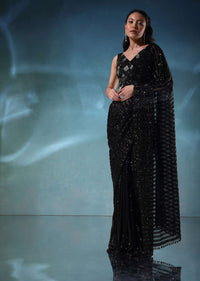 Black Sequins Saree With A Heavily Embroidered Blouse