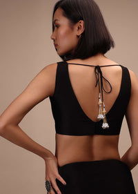 Black Sleeveless Blouse In A Sweetheart Neck Line Straight Hem Line With Back Zip Closure