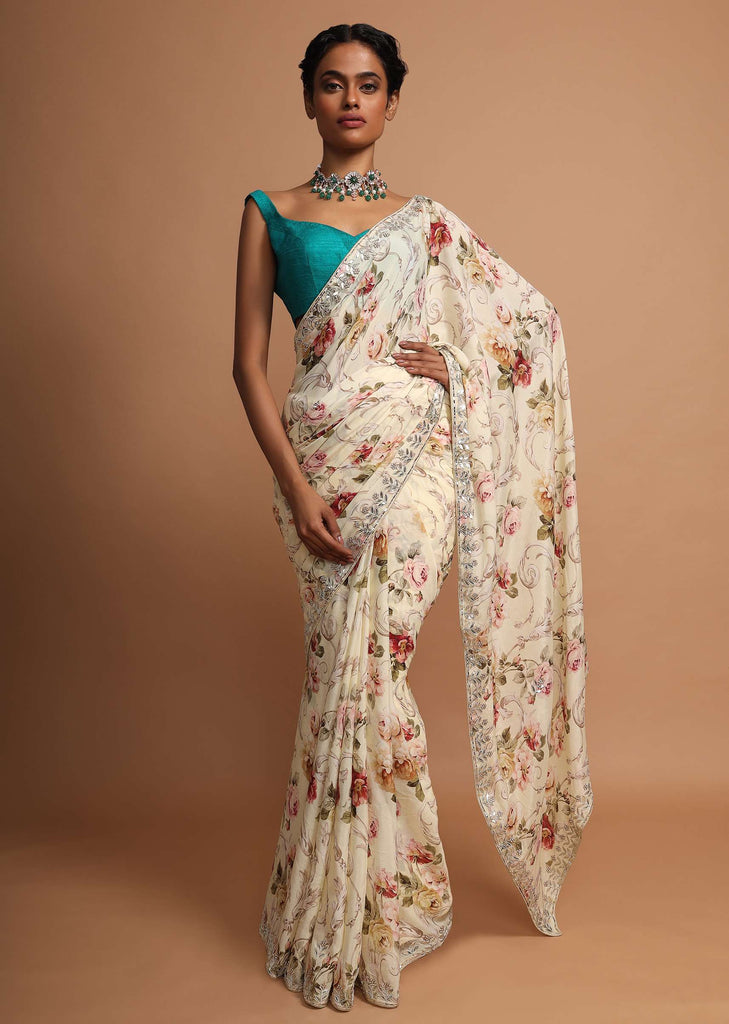Blonde yellow floral printed chiffon saree with gotta and moti embroidered border Online - Kalki Fashion