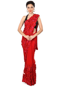 Blood red saree enhanced in resham embroidery only on Kalki