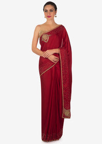 Blood red saree in satin chiffon with moti and zardosi embroidery only on Kalki