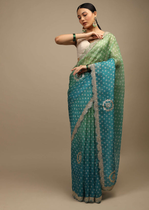 Blue And Green Shaded Saree In Organza With Bandhani Buttis And Gotta Patti Embroidered Scallop Cut Border