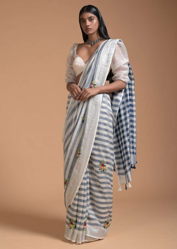 Blue And White Saree In Linen With Woven Stripes And Bud Embroidered Floral Buttis Online - Kalki Fashion