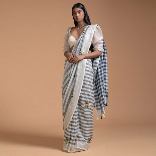 Blue And White Saree In Linen With Woven Stripes And Bud Embroidered Floral Buttis Online - Kalki Fashion