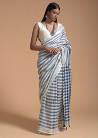 Blue And White Saree In Linen With Woven Stripes And Chain Stitch Embroidered Floral Buttis Online - Kalki Fashion