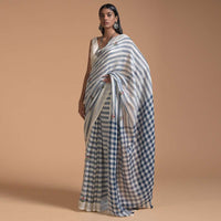 Blue And White Saree In Linen With Woven Stripes And Chain Stitch Embroidered Floral Buttis Online - Kalki Fashion