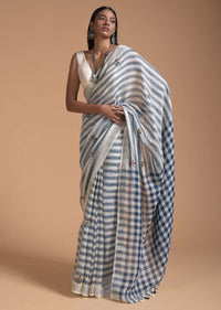 Blue And White Saree In Linen With Woven Stripes And Chain Stitch Embroidered Floral Buttis Online - Kalki Fashion