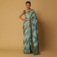 Blue Dola Silk Saree With Diagonal Woven Stripes And Unstitched Blouse Fabric