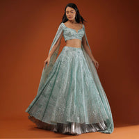 Blue Lehenga And A Crop Top In A Long Cape In Sequins Embroidery, Padding And A Back Hooks Closure.