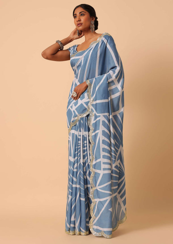 Blue Muslin Abstract Printed Saree With Unstitched Blouse Piece