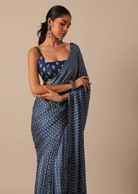 Blue Printed Saree In Satin With Tassel Pallu And Unstitched Blouse Piece