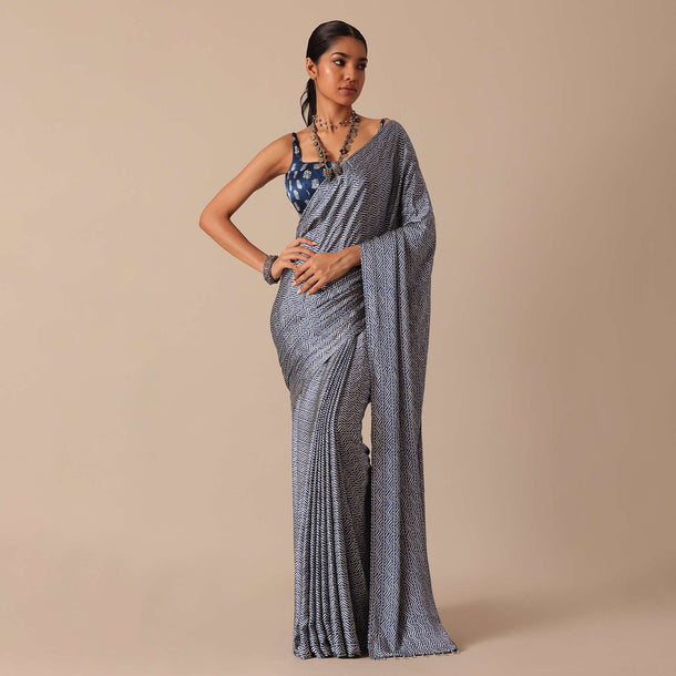 Blue Printed Saree In Satin With Tassel Detail And Unstitched Blouse Fabric