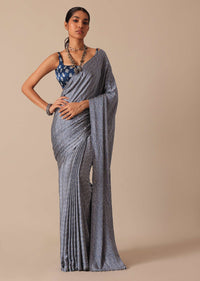 Blue Printed Saree In Satin With Tassel Detail And Unstitched Blouse Fabric