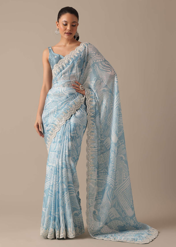 Blue Satin Saree With Printed Detail And Unstitched Blouse Piece