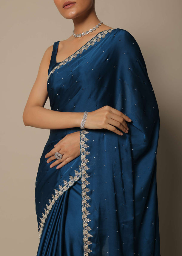 Blue Satin Saree With Stone Studded Border And Unstitched Blouse Piece