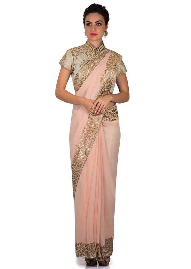 Blush peach saree in applique embroidery only on Kalki