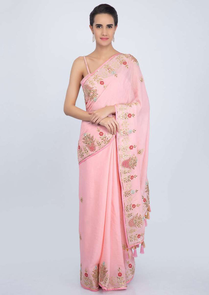 Blush pink crepe chiffon saree with floral embroidered butti and border only on Kalki