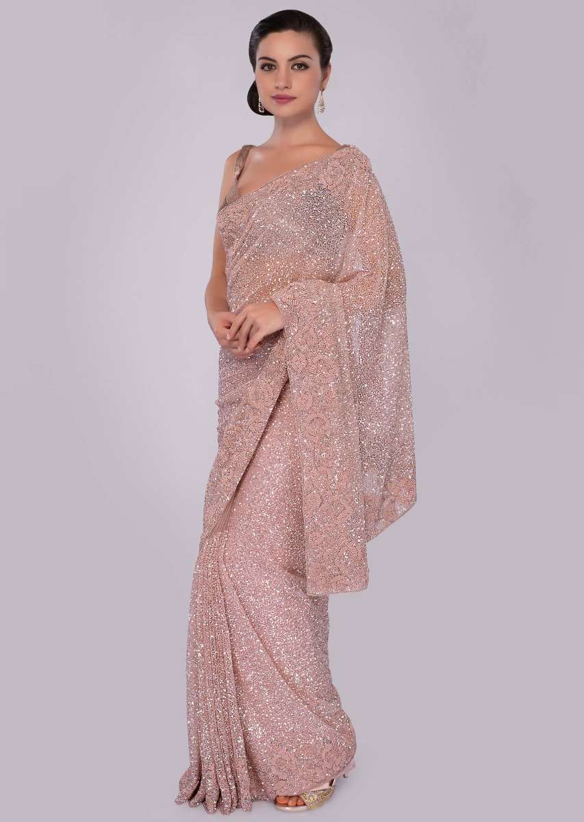 Blush pink hand sequins embroidered saree with spring work border