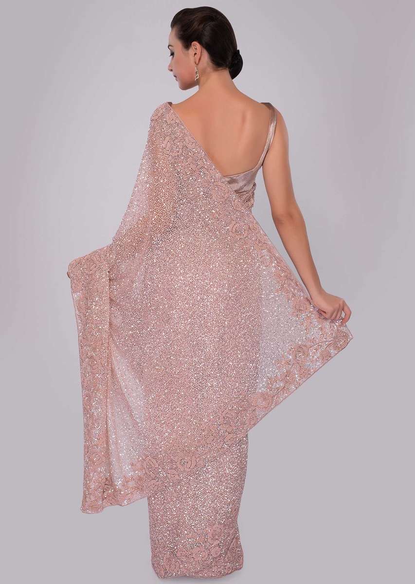 Blush pink hand sequins embroidered saree with spring work border