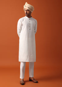 Blush Pink Sherwani Adorned with Intricate Embroidery All Over
