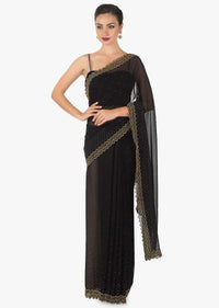 Bold black Cut dana sequin Georgette saree only on Kalki