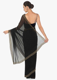 Bold black Cut dana sequin Georgette saree only on Kalki