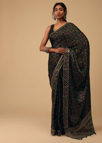 Botlle Green Saree In Muslin With Floral Print And Sequins On The Borders