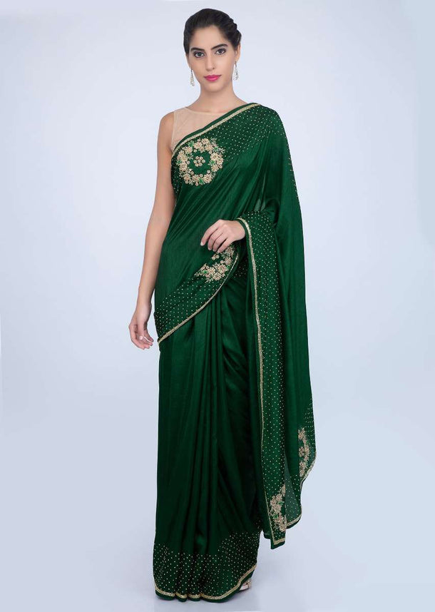 Bottle green dupion silk saree with cut dana and bead embroidered pallo and border only on kalki