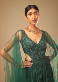 Bottle Green Gown In Crepe With Side Cut Outs In The Hand Embroidered Bodice