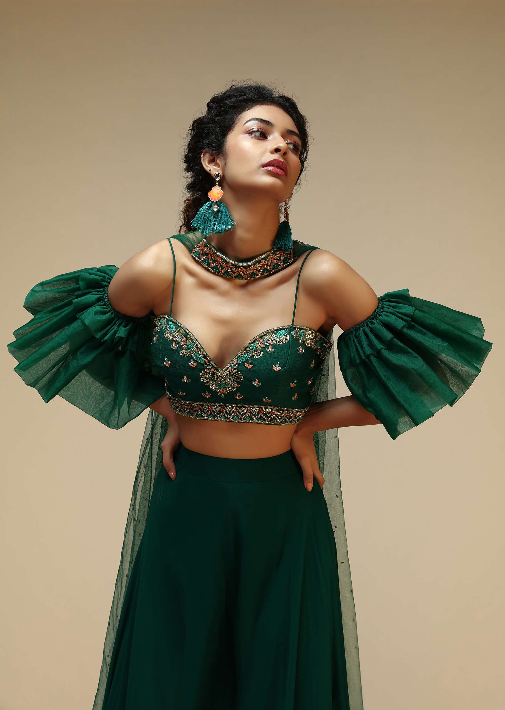 Bottle Green Palazzo Suit With A Cold Shoulder Crop Top Featuring Short Bell Sleeves And Multi Colored Hand Embroidery