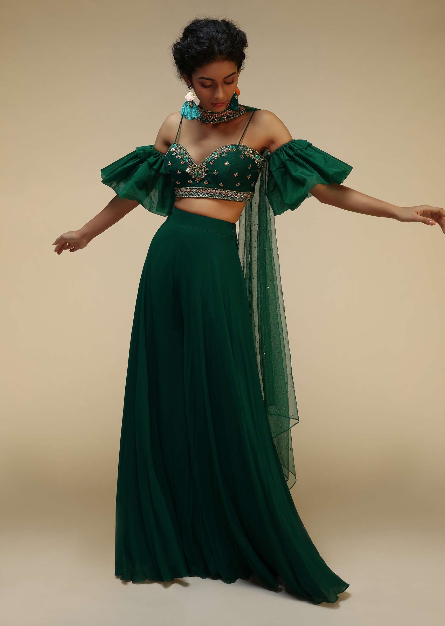 Bottle Green Palazzo Suit With A Cold Shoulder Crop Top Featuring Short Bell Sleeves And Multi Colored Hand Embroidery