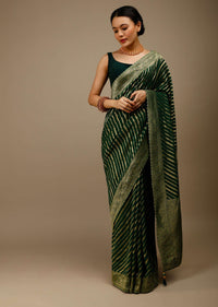 Bottle Green Saree In Georgette With Brocade Woven Diagonal Stripes And Floral Border