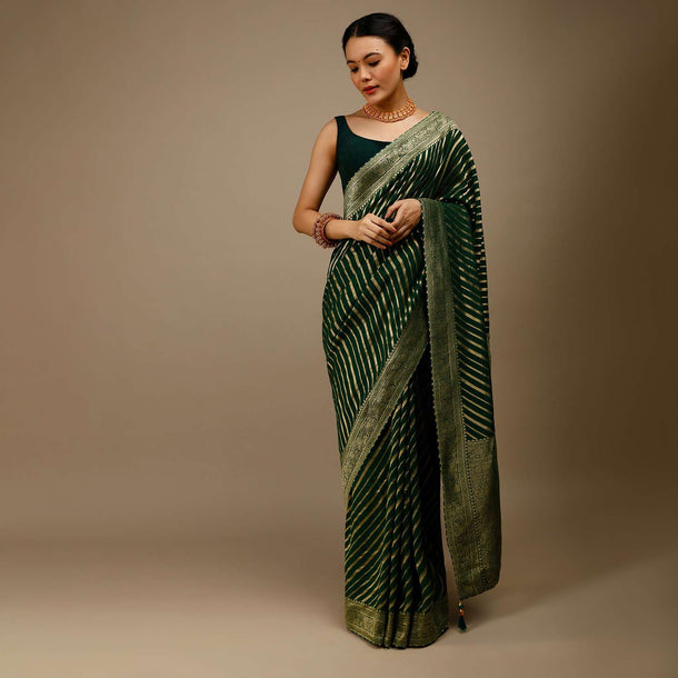 Bottle Green Saree In Georgette With Brocade Woven Diagonal Stripes And Floral Border