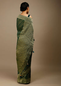 Bottle Green Saree In Georgette With Brocade Woven Diagonal Stripes And Floral Border