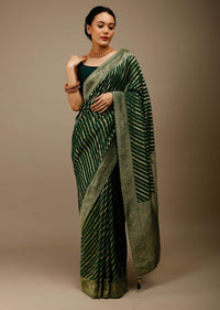 Bottle Green Saree In Georgette With Brocade Woven Diagonal Stripes And Floral Border