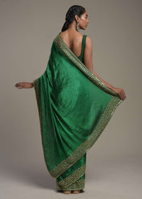 Bottle Green Saree In Satin Blend With Sequins And Zardosi Embroidered Border Design And Unstitched Blouse Online - Kalki Fashion