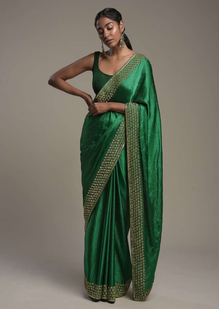 Bottle Green Saree In Satin Blend With Sequins And Zardosi Embroidered Border Design And Unstitched Blouse Online - Kalki Fashion